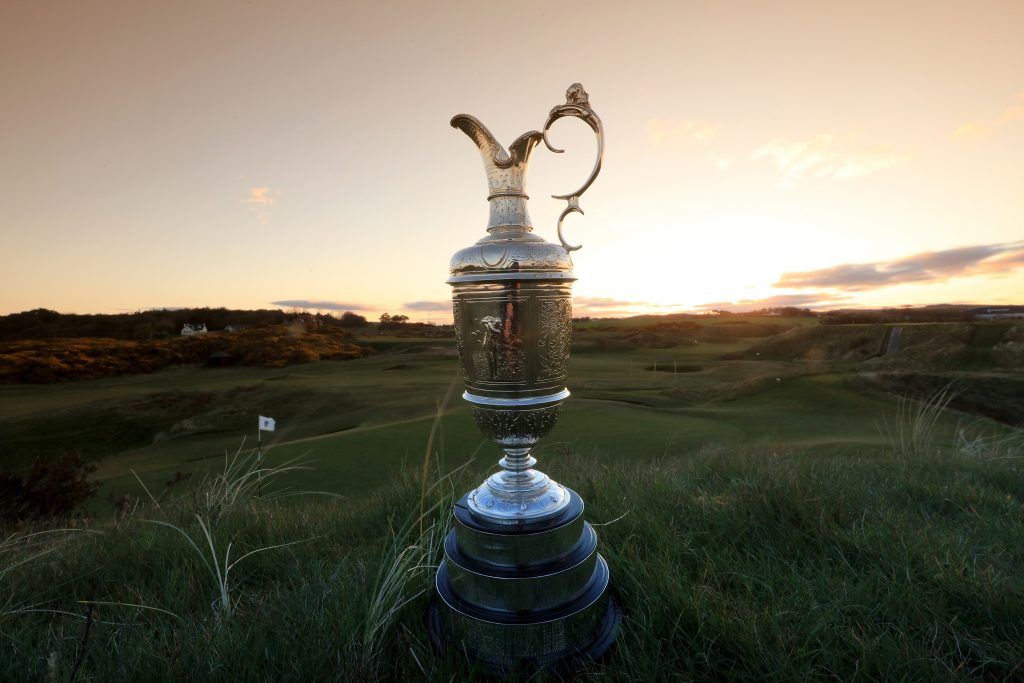 The Claret Jug sitting beside the green at Royal Troon’s famous par three eighth hole –  The Postage Stamp