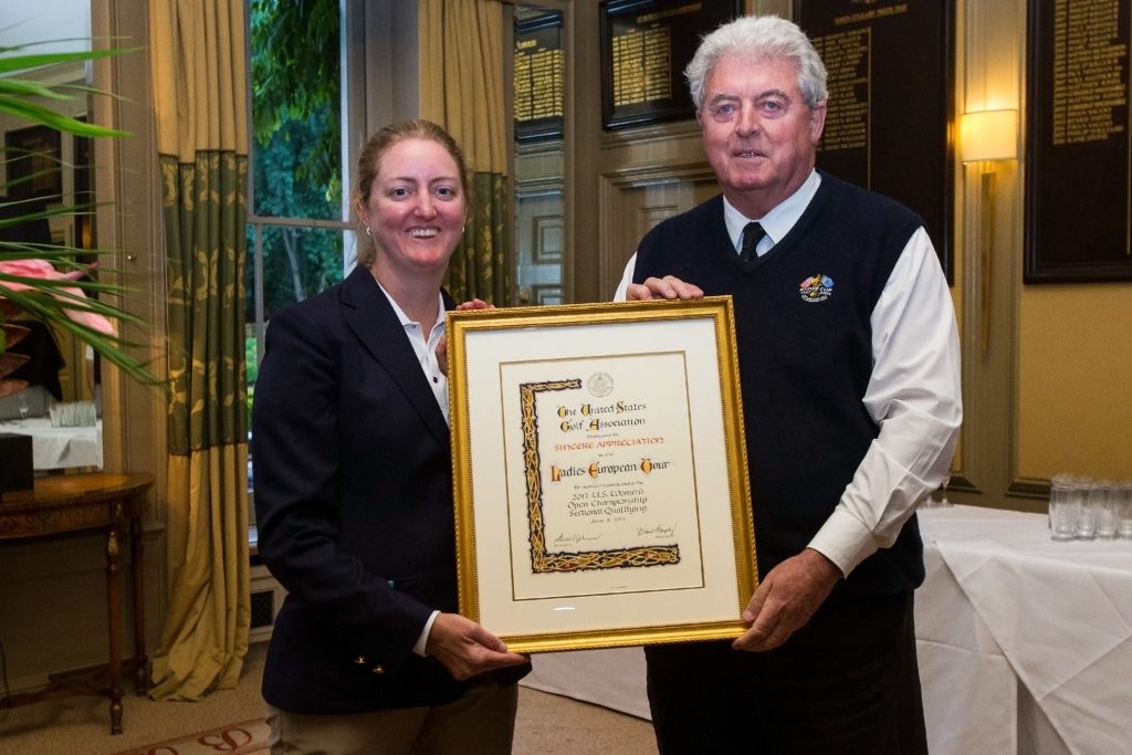 The USGA’s Tracy Parsons of the USGA presents John O'Leary with a commemorative scroll at US Women’s Open Sectional Qualifying, at Buckinghamshire GC, in 2017 
