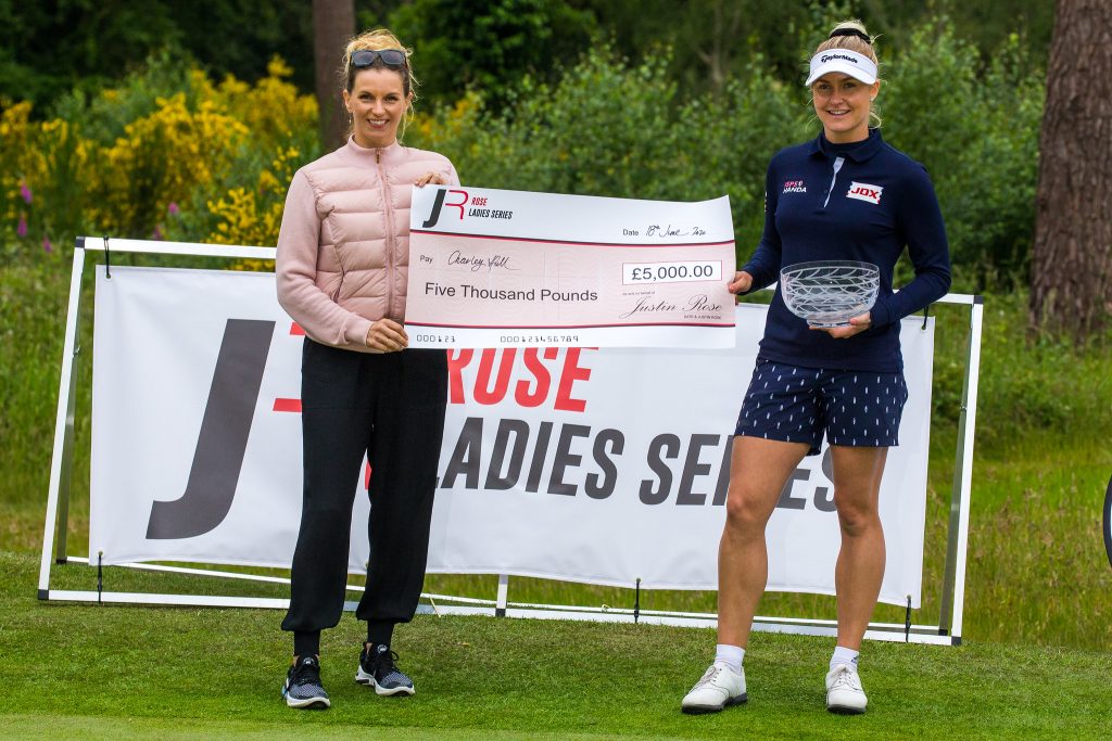 Kate Rose (left) presents Charley Hull with the £5,000 cheque and rose bowl trophy